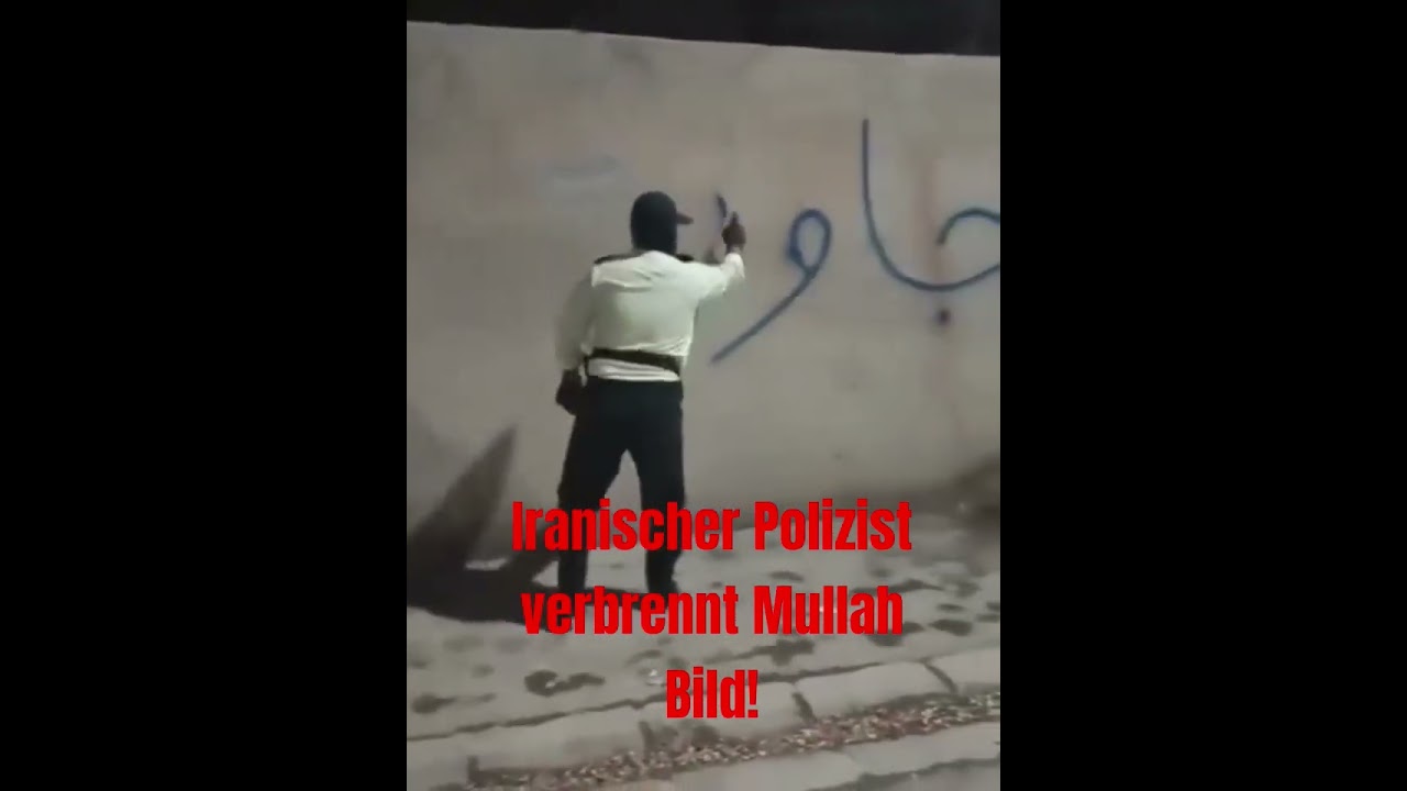 Iranischer Polizist verbrennt Mullah Bild! 