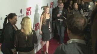 Lindsay Lohan Walks Red Carpet At Scary Movie V Premiere In Hollywood