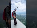 Flying between mountain cliffs #WingsuitFlying