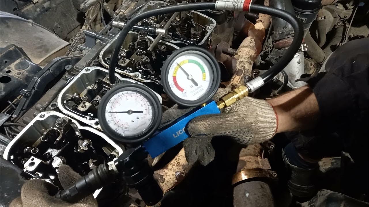 Видео как замерить компрессию на снятом моторе