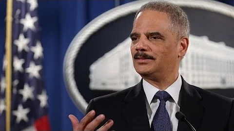 Holder: Ferguson police shooter a 'punk'