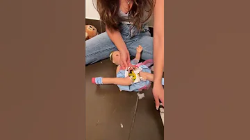 She found something in her daughter’s doll! 😳 #Shorts