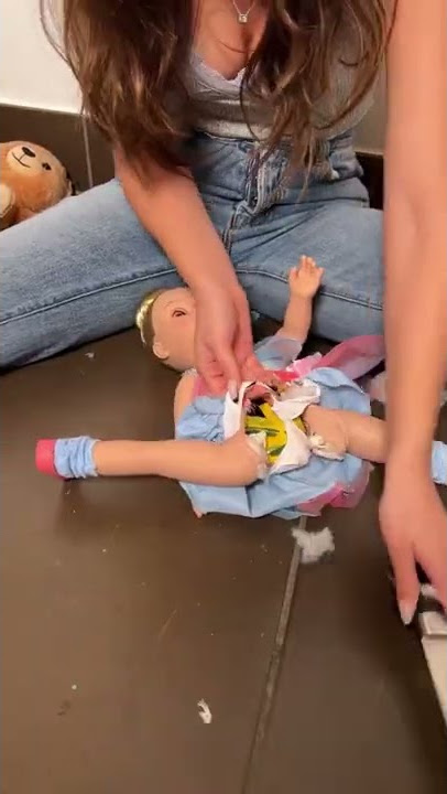 She found something in her daughter’s doll! 😳 #Shorts