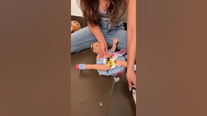 She found something in her daughter’s doll! 😳 #Shorts