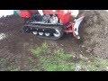 Mini Dozer, Crawler pushing Dirt, Caterpillar