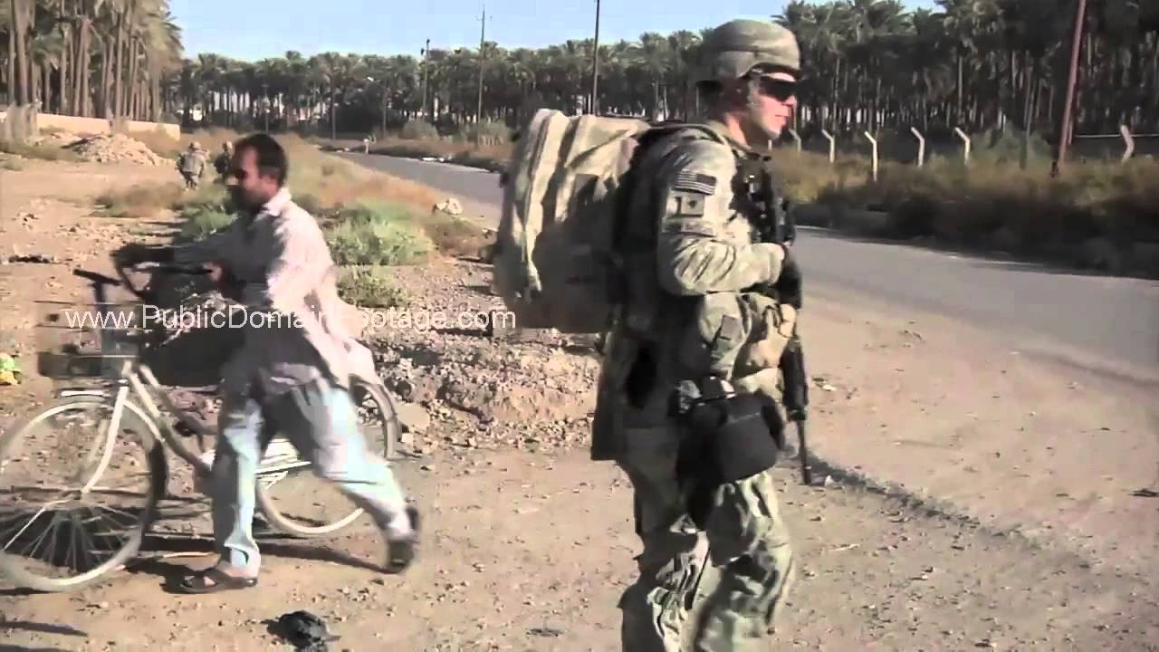 Patrolling streets of Baghdad Iraq War Archival Stock Footage