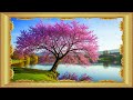 A large blooming cherry blossom tree beside a calm lake, soft pink flowers | Gold Framed TV Art