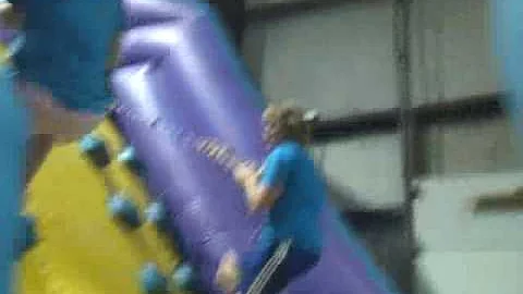 Sara and Trevor racing on the inflatables