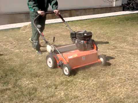 Аэрация газона бензиновым аэратором Husqvarna sadkodesign.com.ua