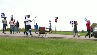 50,000 General Motors union workers walk out over wages, idled plants