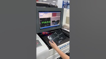 Workers are testing the bottom plate of the luminous mask without the installation of lamp beads