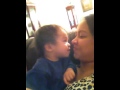 Biting mama's lips while kissing