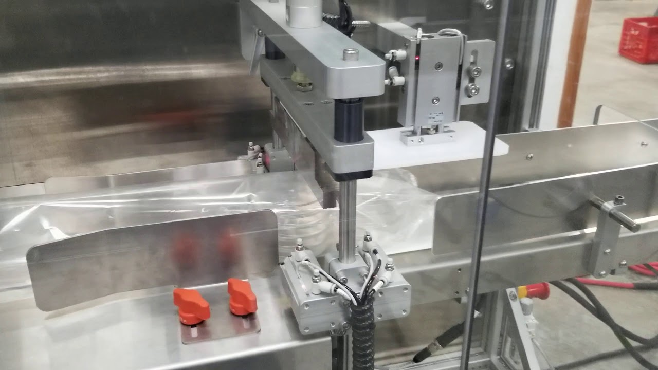 Triple Flow Wrapping Line with Silica Pack and Rad Sticker Vid 2