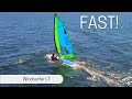 Windsurfer lt fully powered up in 1215 knots