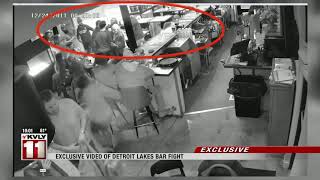 News   Surveillance video of bar fight shows police officer getting punched