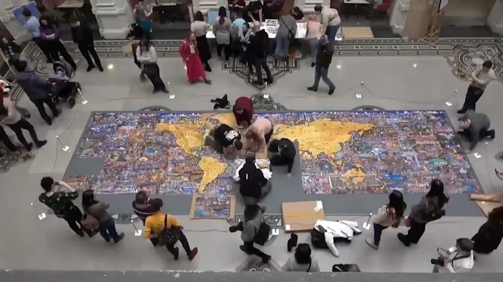 Assembling the world's largest jigsaw puzzles in a minute 'What a wonderful world' 60.000 pieces