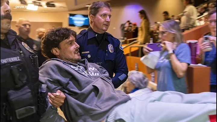 Ex-NFL punter Chris Kluwe arrested after protesting library's 'MAGA' plaque