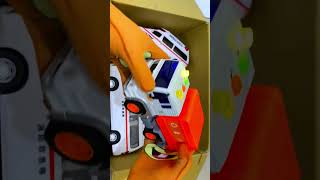 Press the button on the toy track miniature car to test the sound and check its movement kids
