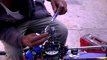 how to change blade grips & head unit part 1.trex helicopter