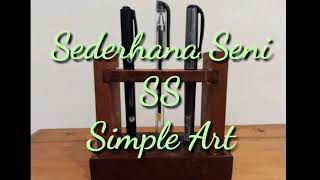 Tempat pensil atau pulpen penghias meja kerja
