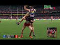 Heeney lays a huge tackle against St Kilda