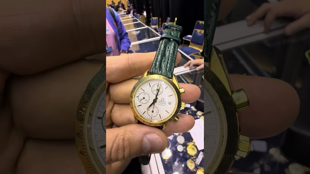 Omega Speedmaster Date из 18-каратного жёлтого золота — стильные часы с легендарным дизайном.