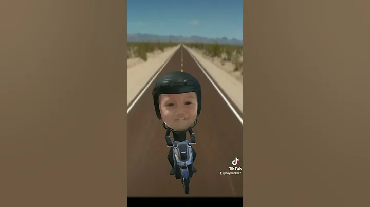 Funny baby in motorcycle
