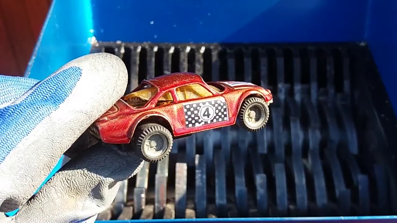 SHREDDING METAL TOY CARS