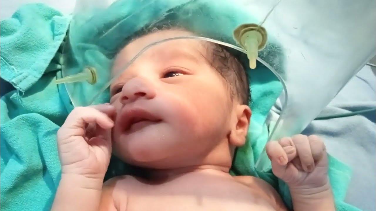 Newborn baby first looks after birth normal delivery baby boy very