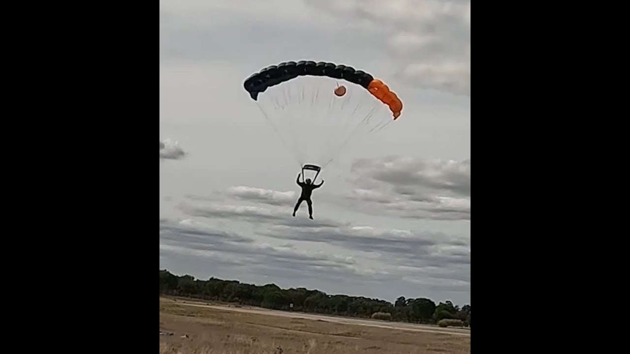 Dan Woodward landing and he's parachuting on his aff skydiving