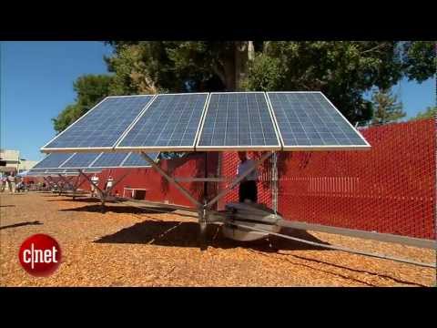 Robots pivot solar panels to face the sun