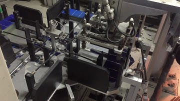 Automatic solar cell tabbing and string machine