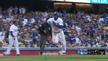 COL@LAD: Gonzalez lifts a sacrifice fly to center