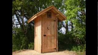 Our new outhouse built from a city tamarack tree that the utility company dropped to protect the power lines.