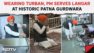 Pm Modi In Gurudwara Wearing Turban Pm Modi Serves Langar At Historic Patna Gurdwara