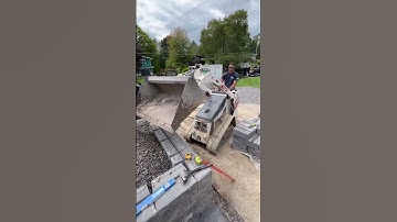 Retaining wall. #hardscaping @BobcatCo @versalok