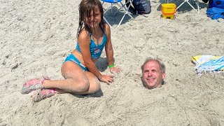 Burying Daddy In The Sand