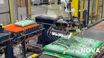 NOVA Automation Open Mouth Bag Filler &  Robotic Palletizing onto Standalone Slipsheet