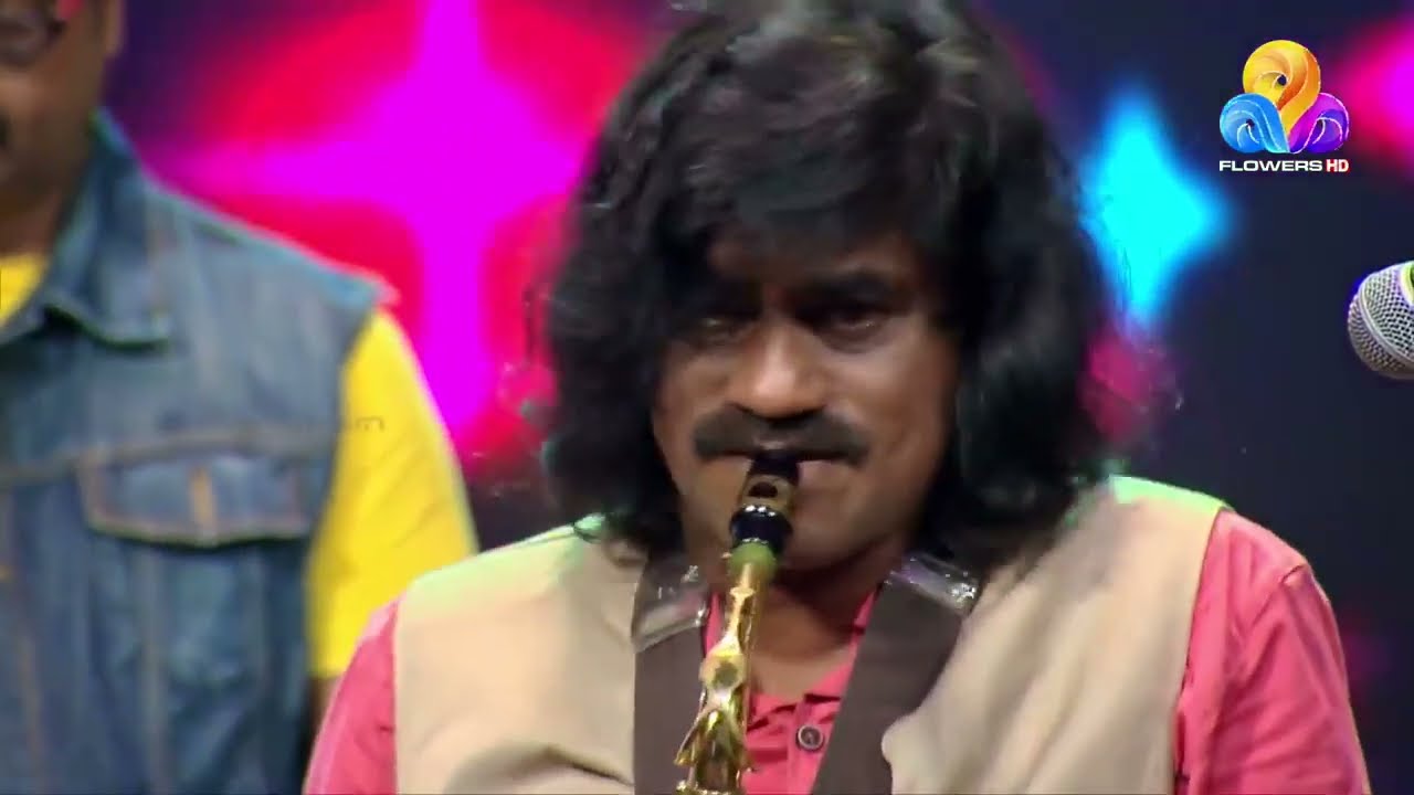 Hero theme music  Indian saxophonist Kalabhavan chackochan  Utsavam Superstar  Flowers TV