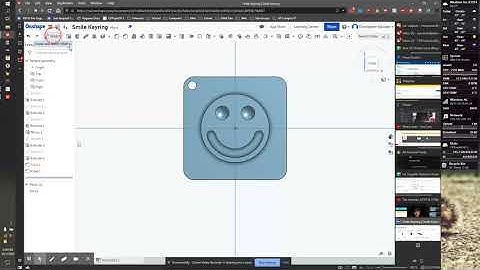 Smile Keyring in OnShape - Smile 4: Adding the hole, fillets, and text.