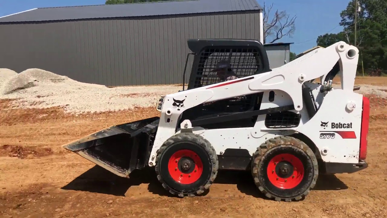 Bobcat s130. Бобкэт s770. Погрузчик Bobcat s770. Бобкэт 770. Bobcat s770 фреза.