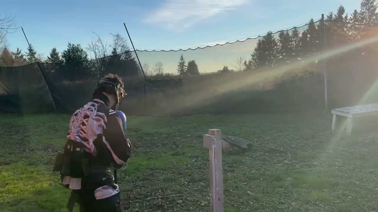RAW Paintball: MLK Day at DBS (01-19-2026) IMG 3311 Kamren rides the OneWheel and shoots at targets.