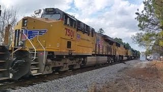 (3424) on Q477-11 5 csx motors + 2 UP motors with a good size train W/ a slow order 10 mph