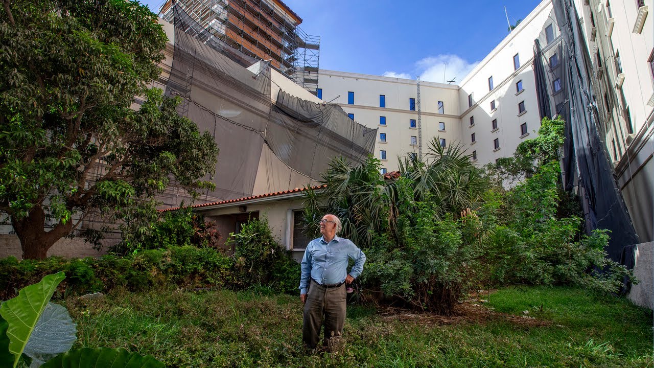 The Plaza Coral Gables engulfs single family home - YouTube