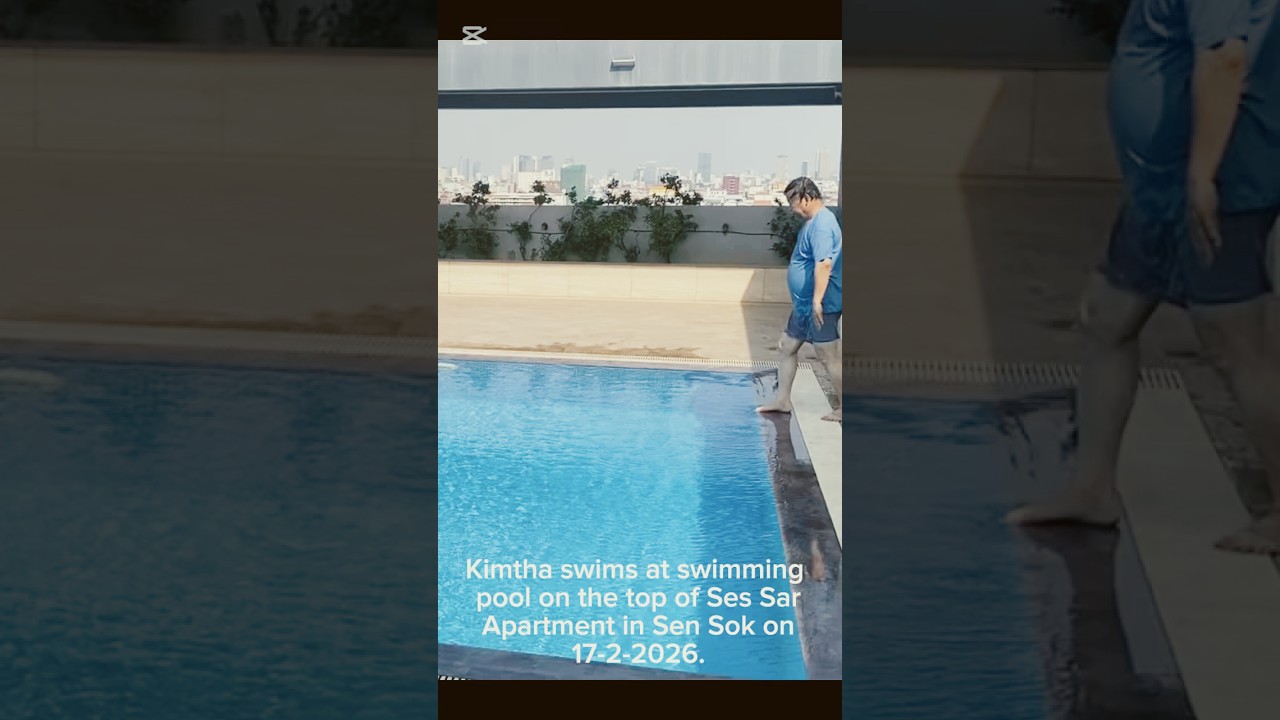 Kimtha, CHA Director, swims at the swimming pool on the top of Ses Sar Apartment