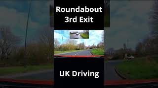 Two lane roundabout turning right third exit