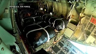 US military aircraft airdrop thousands of meals into Gaza in emergency humanitarian aid operation