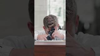 IWC watchmaker Thomas Zimmerman assembles the Pilot’s Watch Timezoner TOP GUN Woodland. – IWC Schaffhausen watch video