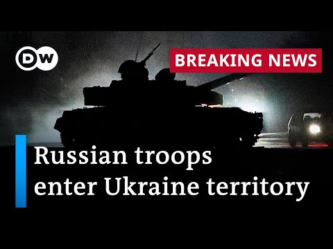 Russia 'peacekeeping' forces march into Ukraine separatist regions | DW News
