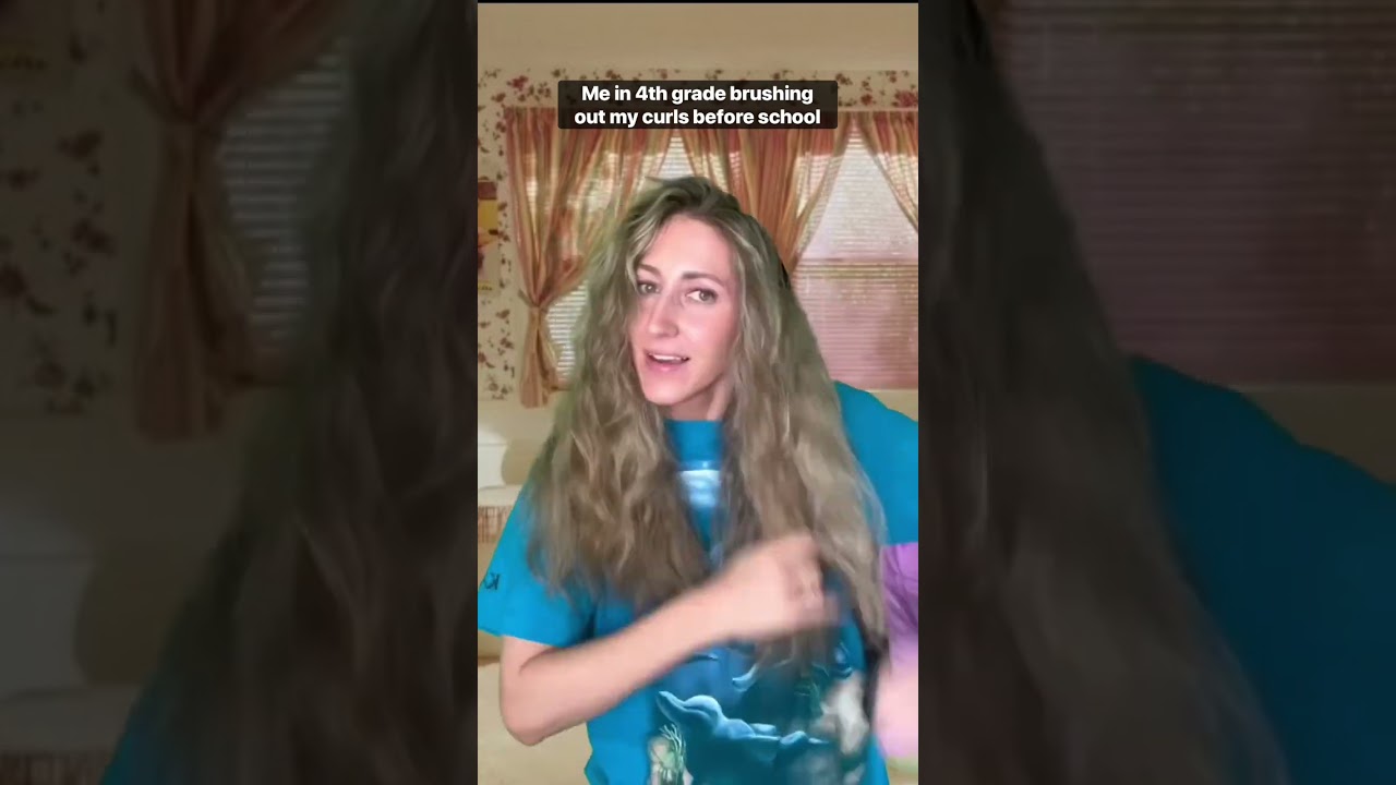 Me in 4th grade brushing out my curls before school